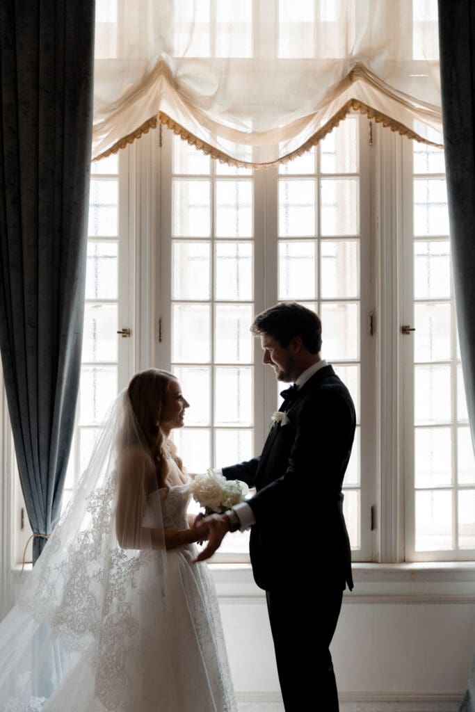 bride and groom emotional during their first look