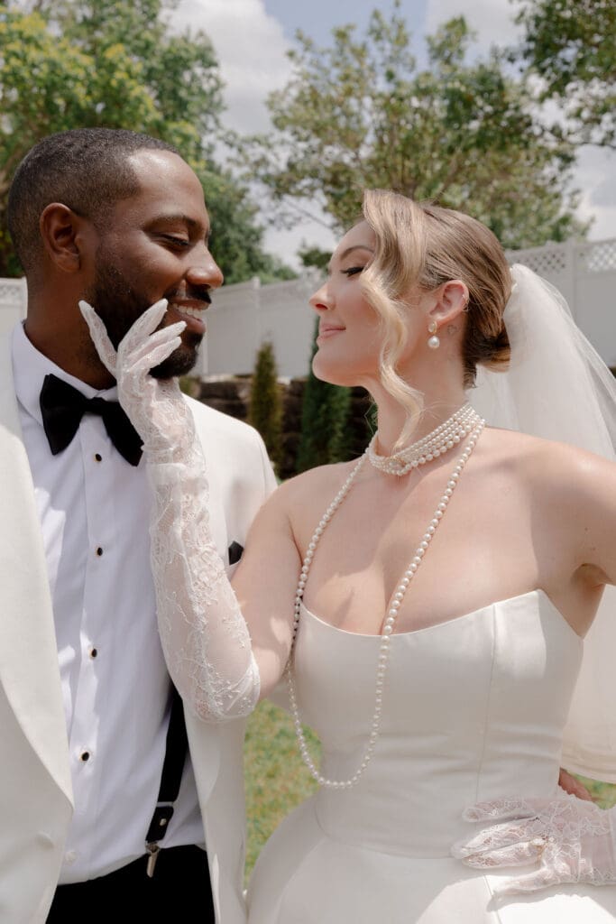 cute picture of the bride and groom smiling at each other