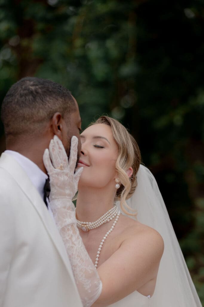 beautiful portrait of the bride and groom kissing