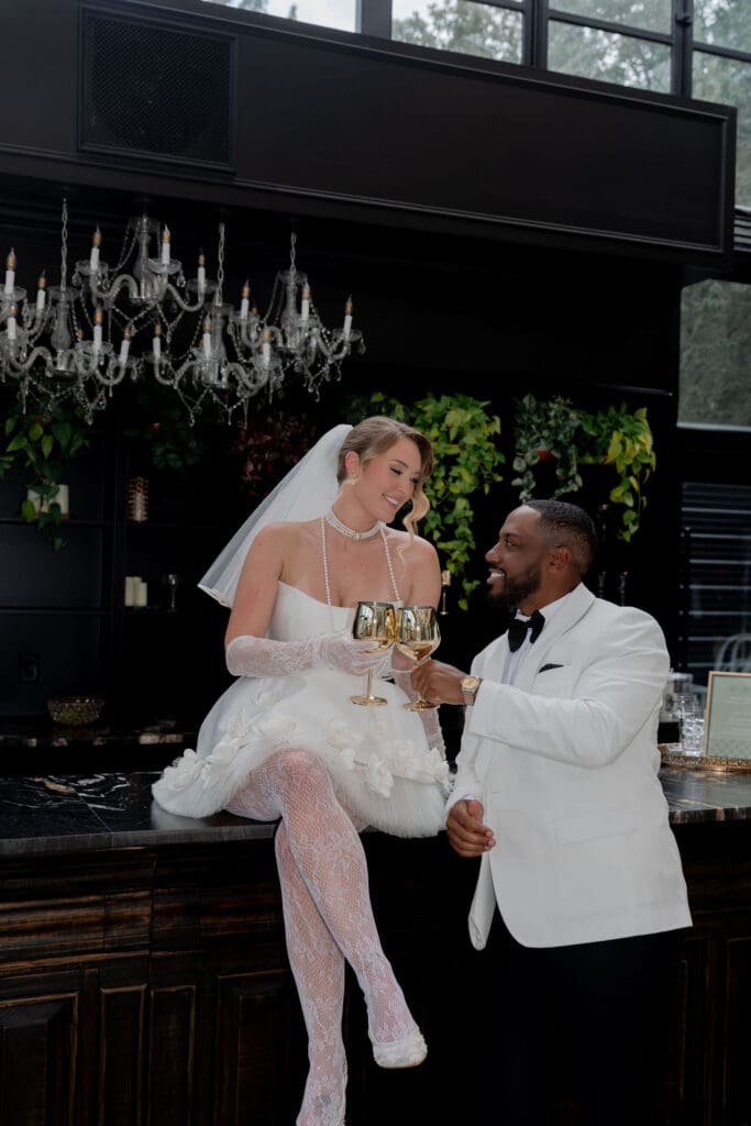 bride and groom laughing with each other during their photoshoot