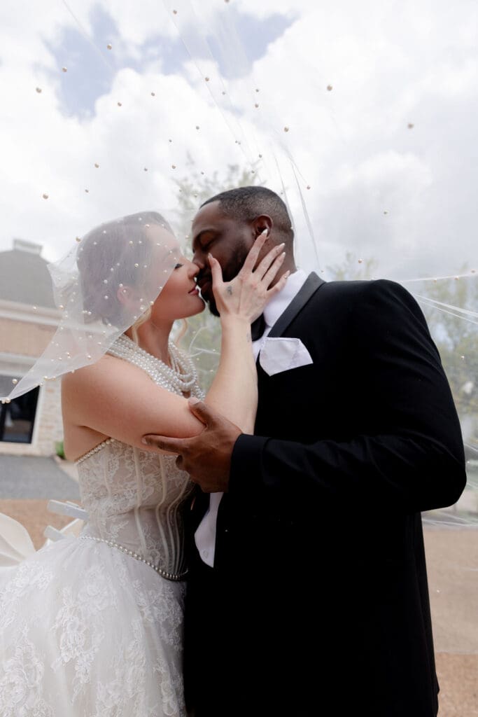 beautiful picture of the newlyweds kissing